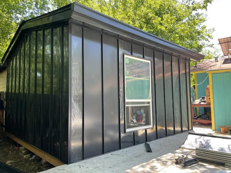 Black standing seam metal wall panels for Metal Roof Installation in Lenox