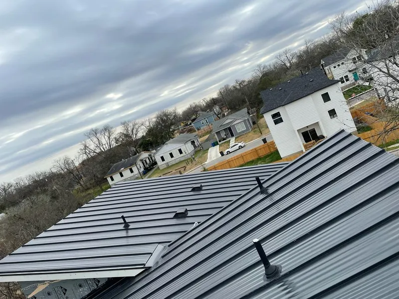 Standing seam metal roof panels with vents for Skylight Repair in Lenox